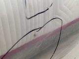 a close up of a piece of plastic on the floor