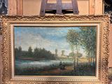une image d'un tableau sur un chevalet dans une pièce