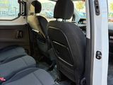 a white van with two seats in the back of it