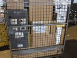 a large metal cage with a bunch of boxes on it