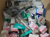 a box full of toothbrushes and toothpaste in it