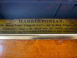 a plaque on the back of a piano that says hamletian