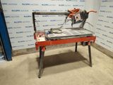 a picture of a table with a tile saw on it