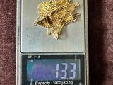 a scale with a bunch of screws on top of it