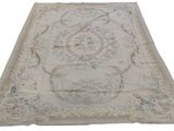 an antique rug with a floral design on a white background