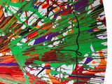 brightly colored paint splattered on a paper umbrella on a white background