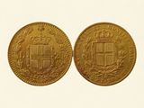 deux pièces d'or portant un blason