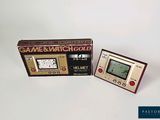 a game and watch gold box next to a game and watch gold box