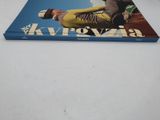 a blue book with a picture of a man on a snowboard