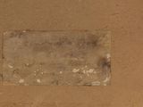 an old picture of a piece of paper on the ground