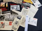 many different types of postcards on a table