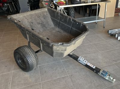 an image of a wheelbarrowd cart in a garage