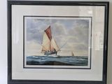 painting of a sailboat in the ocean in a black frame