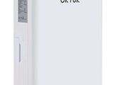 une image représentant un purificateur d'air blanc sur lequel est inscrit le mot « okyuk »