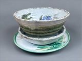 three bowls and a plate on the table