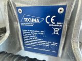 a sign on the side of a machine that says techna