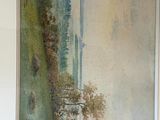 a picture of a painting on the wall above a bed