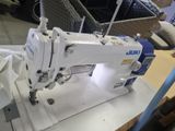 a sewing machine that is sitting on a table