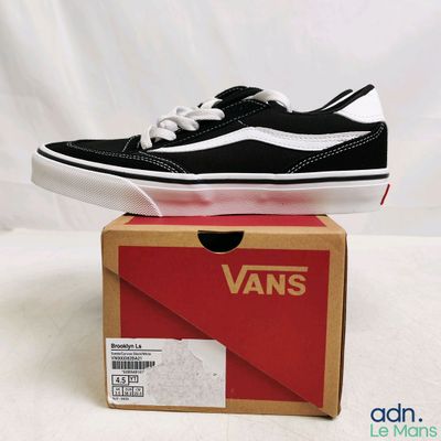 vans old skooler black and white sneakers in a box