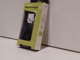 a box with a cell phone in it on a counter