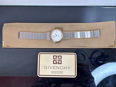 GIVENCHY Montre bracelet quartz en métal et métal doré ; poc…