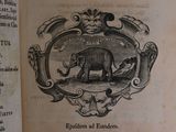 an old book with a picture of an elephant on it