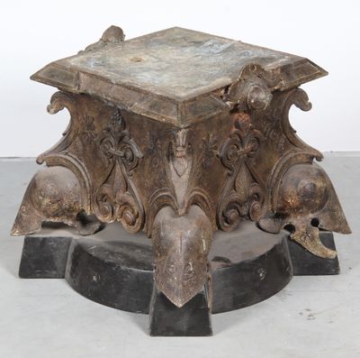 a small table with a marble top on a pedestal