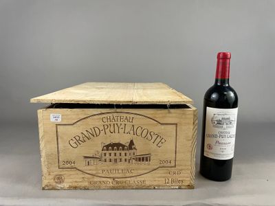 a wooden box with a bottle of wine next to it