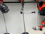 a lot of tools that are hanging on the wall