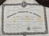 a certificate on a piece of paper on a table