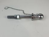 a close up of a metal ball and chain on a table
