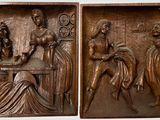 two bronze plaques depicting women playing cards and playing cards on a table