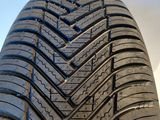 a close up of a tire on a white surface