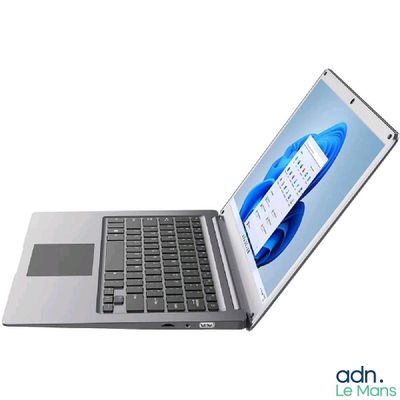 a laptop computer that is open on a white surface