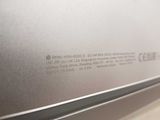 a close up view of a silver refrigerator with a label on it