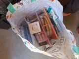 a bag full of items that are sitting on the floor