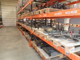 many different types of tools on the shelves in the warehouse