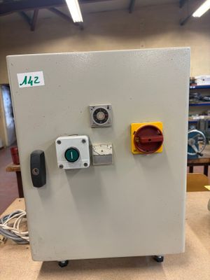 a white box with a red light and a green light