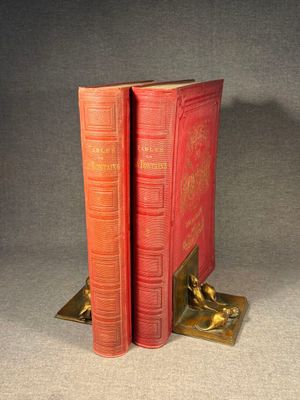 pair of antique red bookends on gold plated base