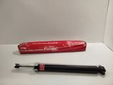 a pen that is sitting on a table next to a pen