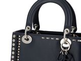 black leather handbag with rivets and silver hardware