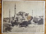 an old picture of a picture of a building with a clock tower