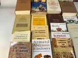 a lot of books that are on a table