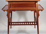 an image of a small wooden table with a drawer underneath it