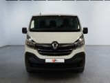 the front view of a white van parked in a garage
