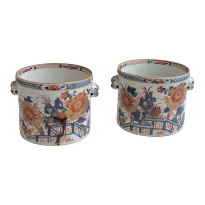 pair of chinese vases with floral designs and handles