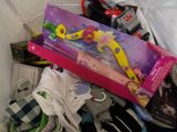 a pink box with a yellow and pink toothbrush in it