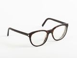 a pair of glasses sitting on top of a white surface