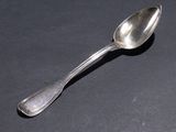 a spoon that is sitting on a table