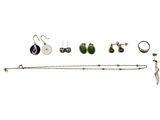 an assortment of jewelry including a necklace, bracelet, and earrings